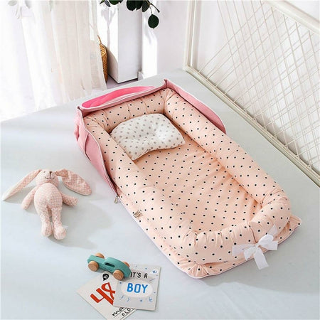 Réducteur de Lit bébé Rose