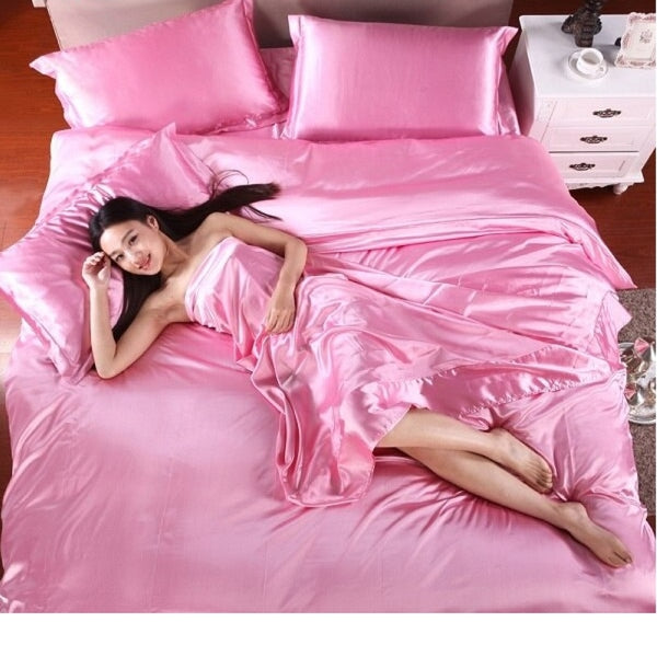 Parure de lit unie rose en satin – Le Royaume du Bébé