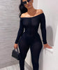 Combinaison en maille noire transparente