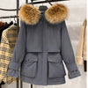 Doudoune en fourrure de raton laveur pour femme