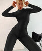Combinaison moulante tenue de sport dos nu