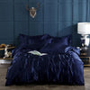 Parure de lit bleue soyeuse