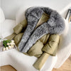 Doudoune avec col en fourrure grise et manches en tricot