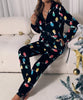 Combinaison polaire motif guirlandes de Noël