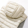 Doudoune fine longue beige sans manche avec capuche