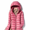 Doudoune fine longue rose avec capuche amovible pour femme