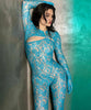 Combinaison pantalon transparente bleue en dentelle