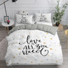 Parure de lit blanche inscription « Love is all you need »