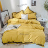 Parure de lit jaune contour marron