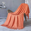Couverture nordique tricotée orange