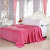 Couverture de lit rose