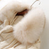 Doudoune beige fourrée à col haut pour femme