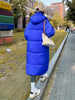 Doudoune longue à capuche bleue