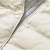 Doudoune fine longue beige sans manche avec capuche