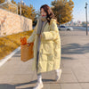 Doudoune jaune longue en duvet pour femme