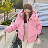 Doudoune large rose à capuche pour femme