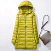 Doudoune mi-longue jaune à capuche pour femme