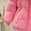 Doudoune rose à poches et à capuche pour femme