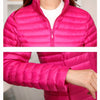Doudoune rose mi-longue et cintrée pour femme