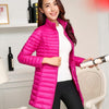 Doudoune rose mi-longue et cintrée pour femme