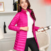 Doudoune rose mi-longue et cintrée pour femme