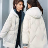 Doudoune blanche mi-longue à capuche pour femme