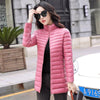 Doudoune fine mi-longue rose à col haut pour femme