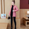 Doudoune fine mi-longue rose à col haut pour femme