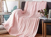 Plaid rose en tricot doux torsadé