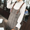 Robe salopette à carreaux