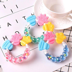 Anneau de Dentition Musical - Le Royaume du Bébé